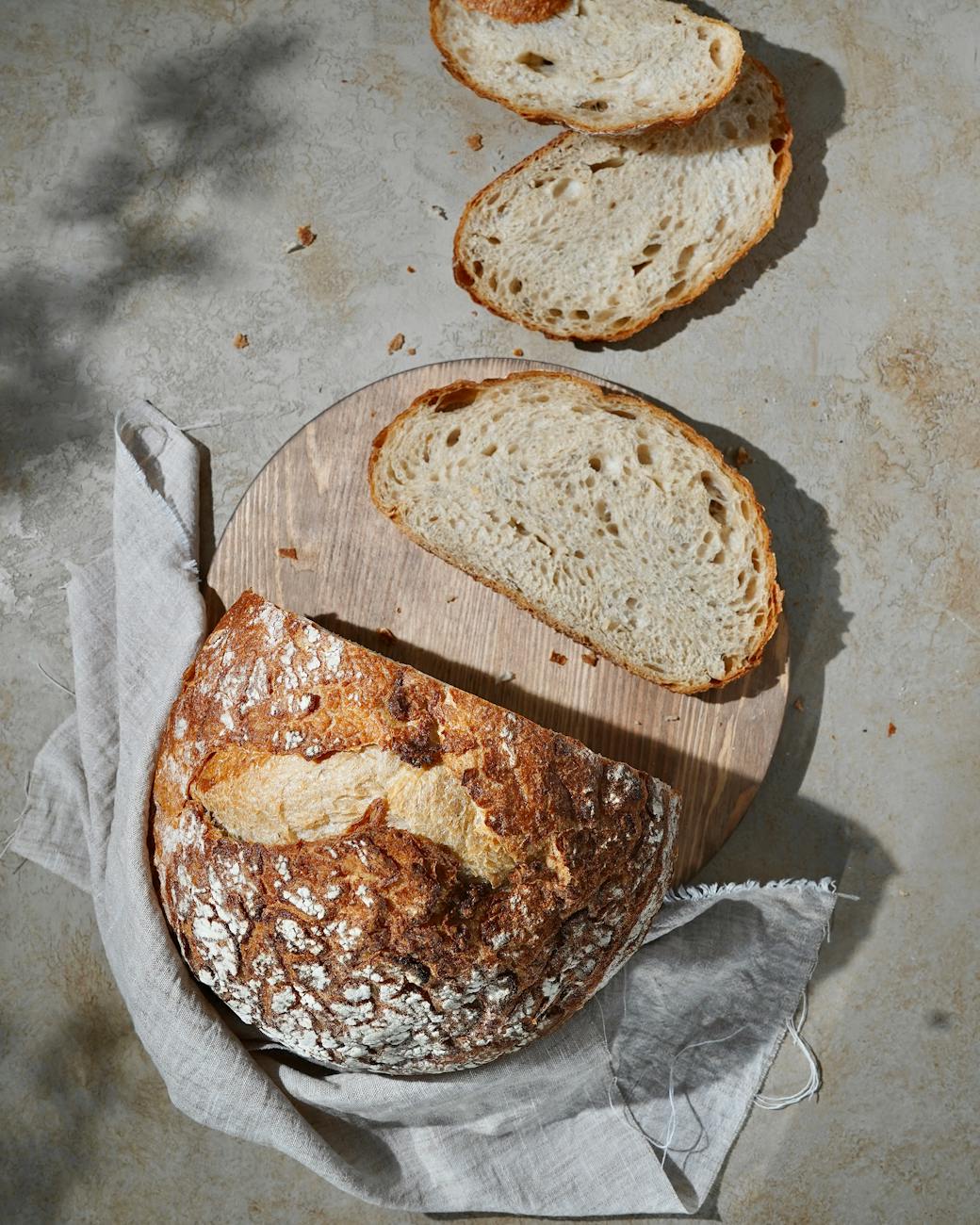 rustic sourdough bread on wooden board